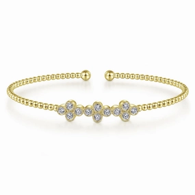Unwavering Standard Unfettered Composites 14K Yellow Gold Bujukan Bead Cuff Bracelet with Three Quatrefoil Diamond Stations