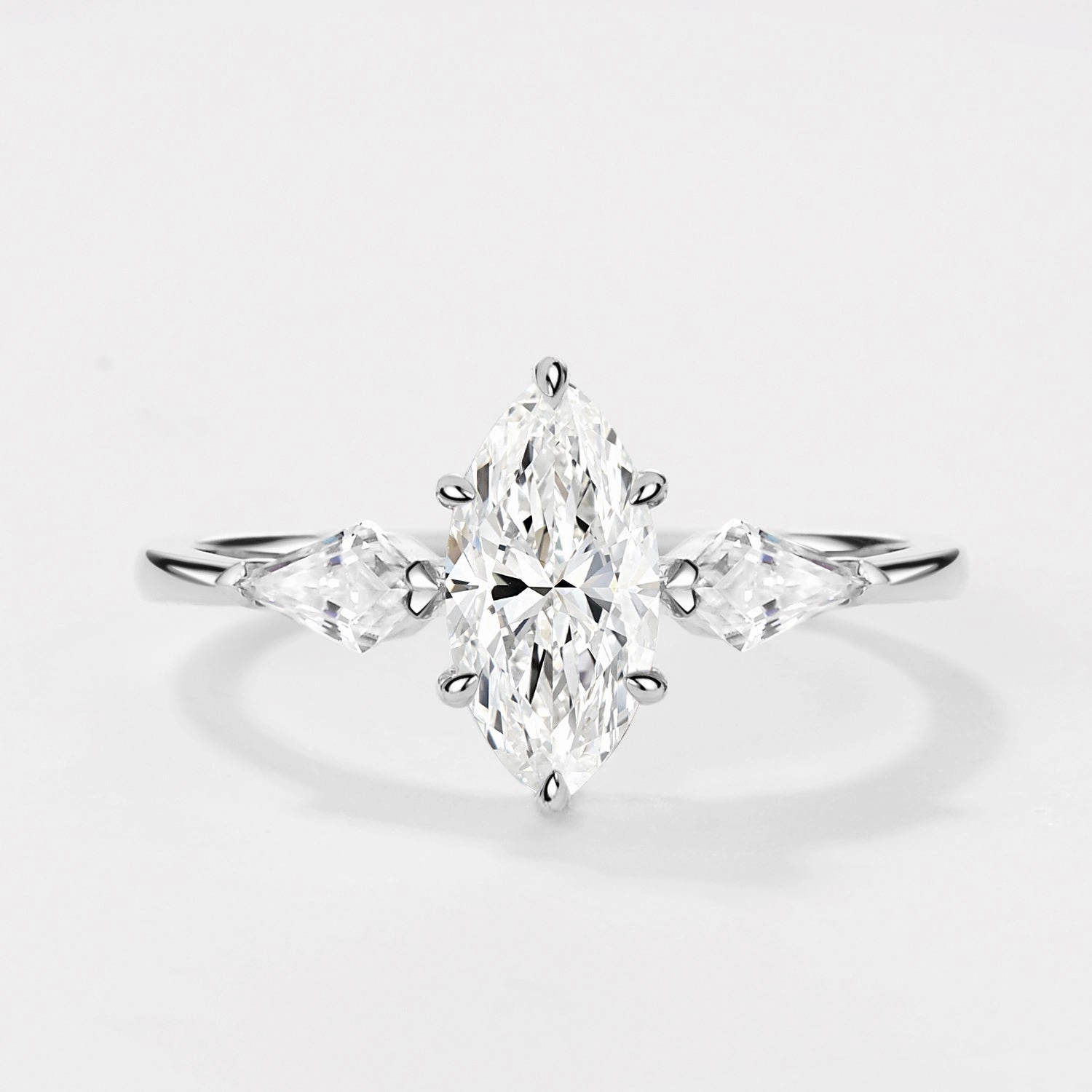 Effortless Glow 1.0ct Marquise Cut Lab Grown Diamond Three Stone Engagement Ring