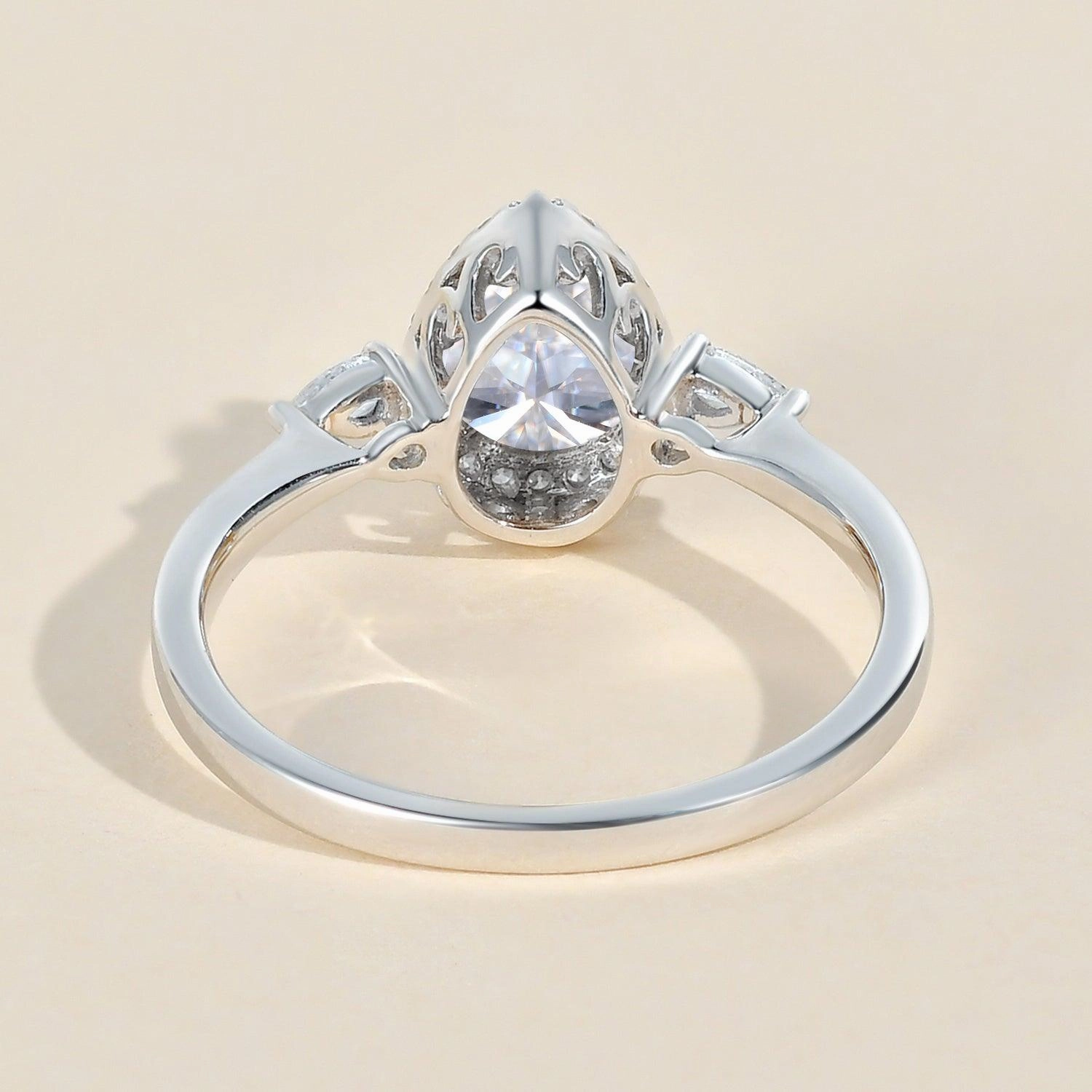 Romantic Look Graceful Flow 1.0ct Pear Shaped Moissanite Three-Stone Halo Ring