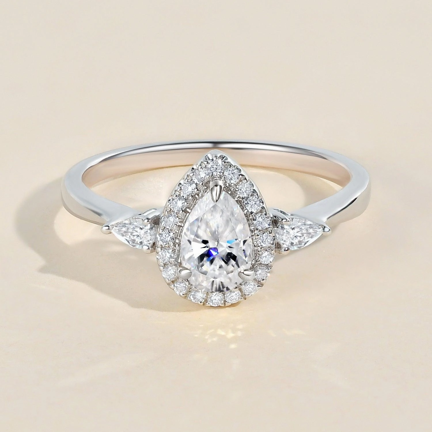 Contemporary Craft Top Pick 1.0ct Pear Shaped Moissanite Three-Stone Halo Ring