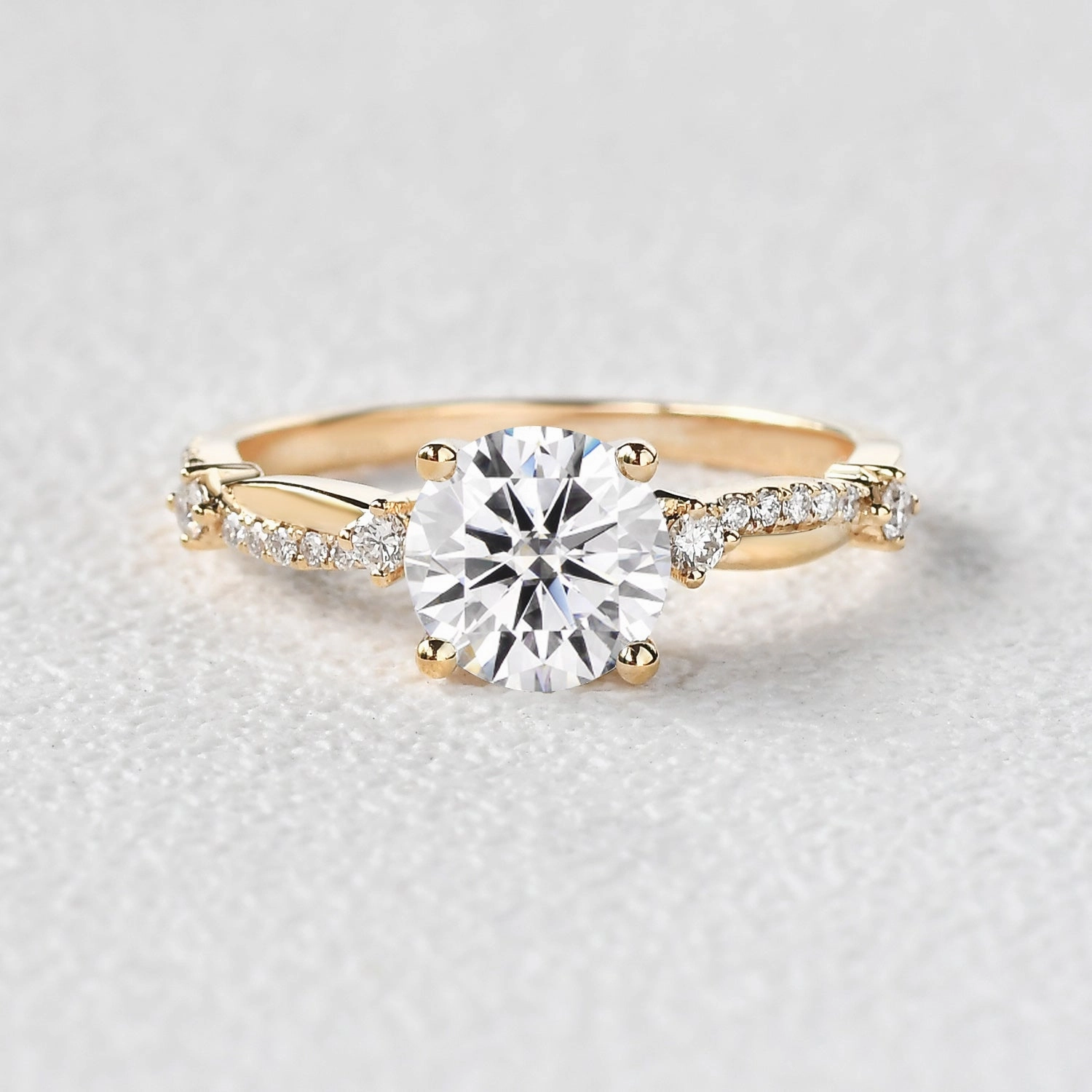 Inspired Feature 1.0ct Round Cut Moissanite Twisted Solitaire Ring