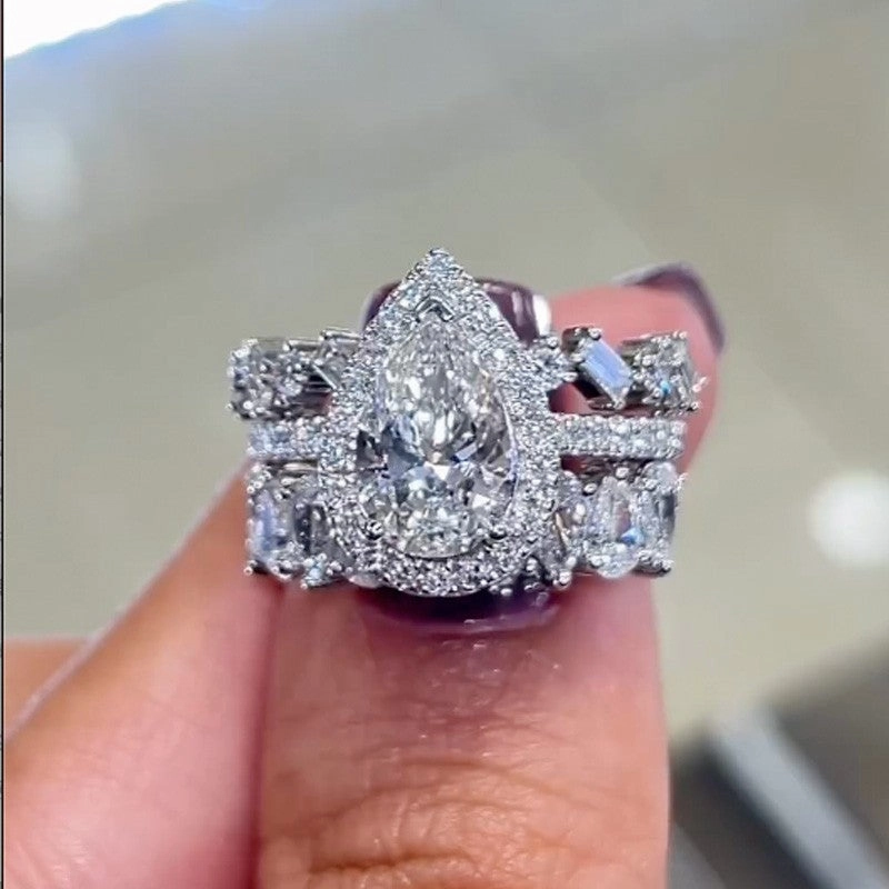 Refined Charm Clean Lines 2.2 Carat Halo Pear Cut Wedding Ring Set With Two Luxurious Wedding Bands