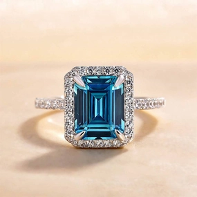 Evergreen style Louily Halo Emerald Cut Light Aquamarine Blue Engagement Ring In Sterling Silver