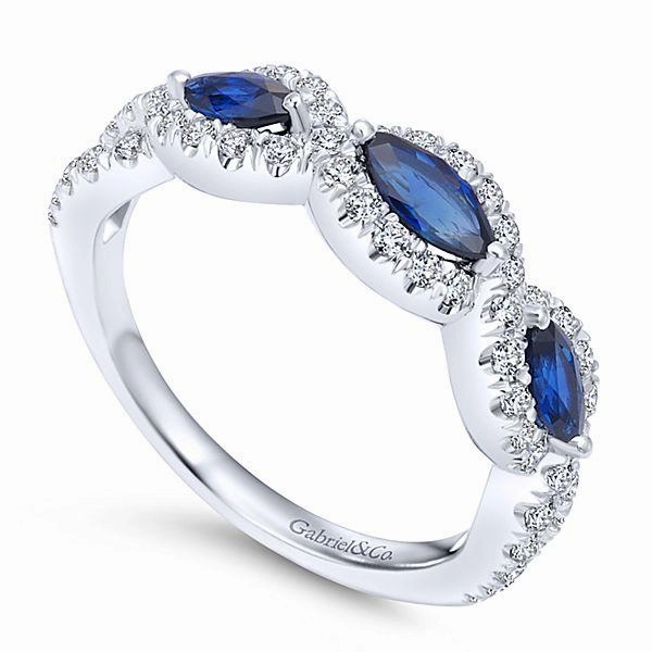 Fashionable Piece Marquise Shaped Diamond And Sapphire Ring .76 Cttw 14K Gold