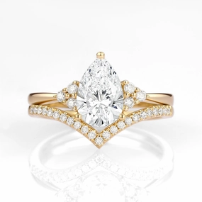 Polished Highlights 1.0ct Pear Cut Lab Grown Diamond Curved Engagement Ring Set 2pcs