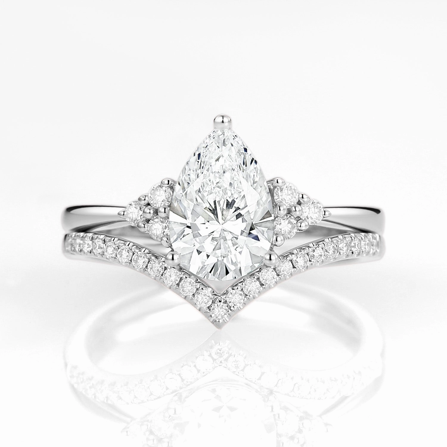 Subtle Touch Opulent Edge 1.0ct Pear Cut Lab Grown Diamond Curved Engagement Ring Set 2pcs