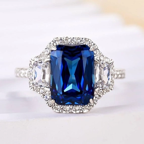 Seasonal Sparkle Louily Halo Blue Sapphire Cushion Cut Three Stone Engagement Ring In Sterling Silver