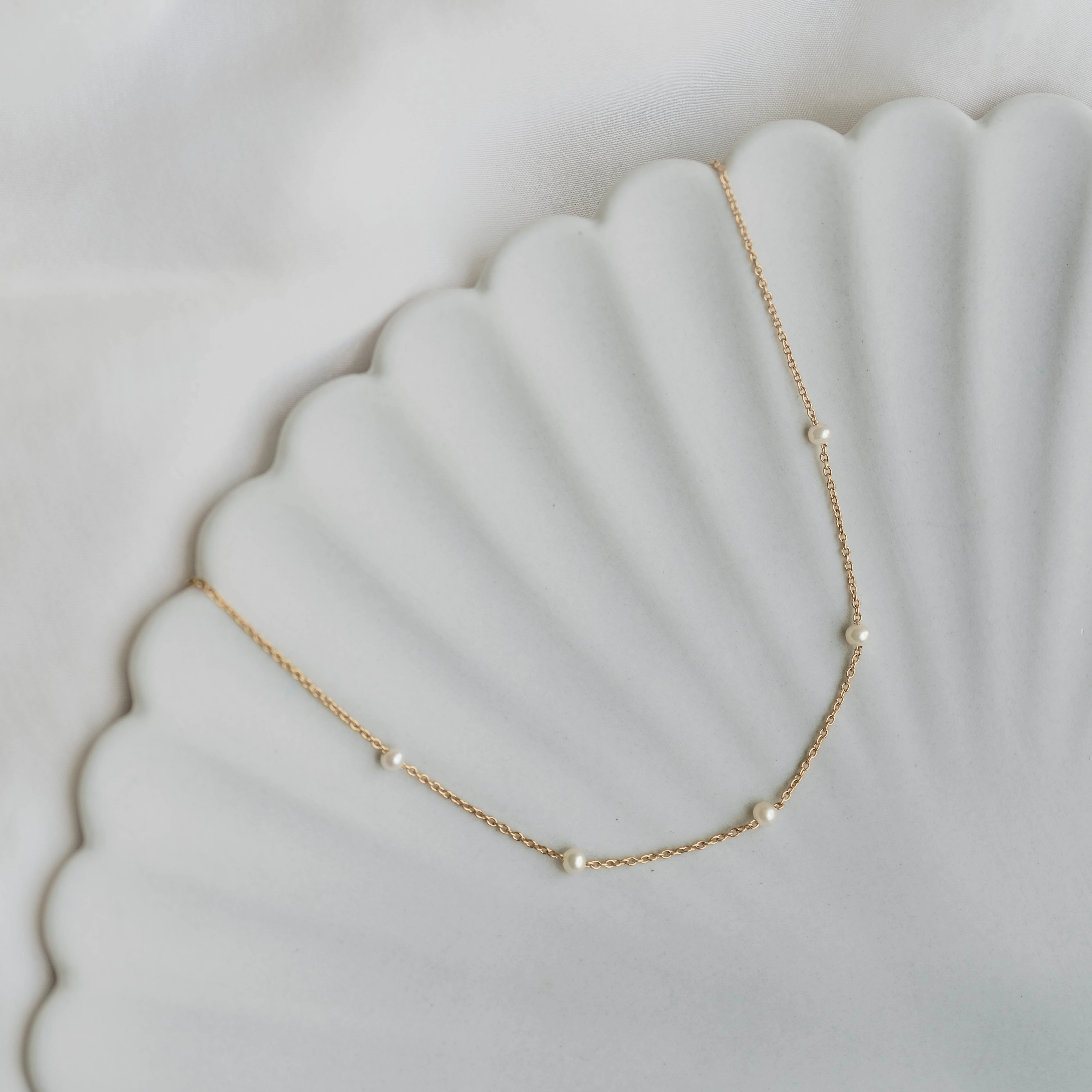 Sleek Glamour Refined Look Pearl Station Necklace - Adara