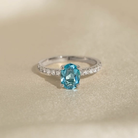 Worldly Charm Warm Finish Oval Swiss Blue Topaz and Diamond Ring White Gold - Minette