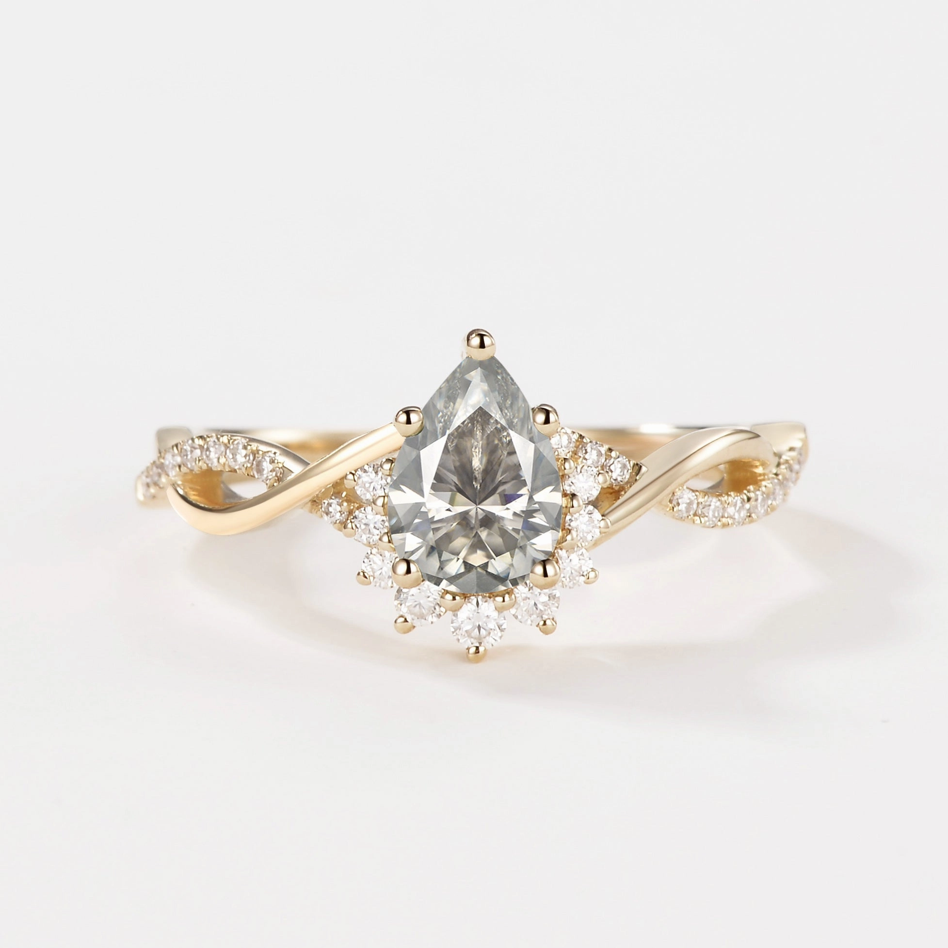 Understated Form Pear Moissanite Infinity Engagement Ring