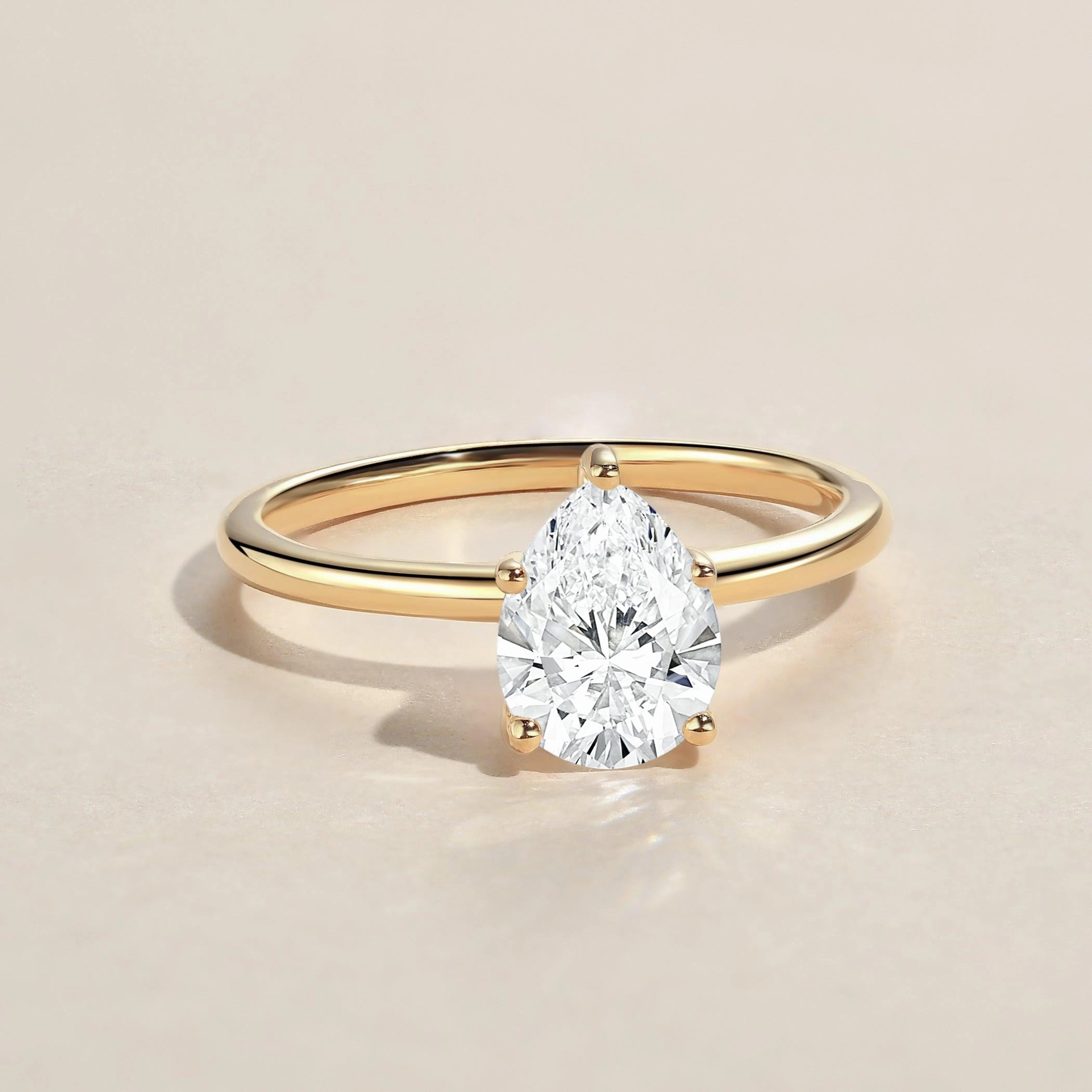 Pear Shaped Lab Grown Diamond Classic Solitaire Ring Subtle Elegance