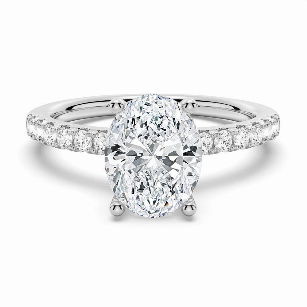 Dazzling Sparkle Petite Micropav?? Oval Shaped Moissanite Engagement Ring