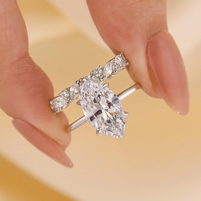 Subtle Mood 4.0Ct Marquise Cut Wedding Ring Set With Marquise Cut & Round Cut Wedding Band