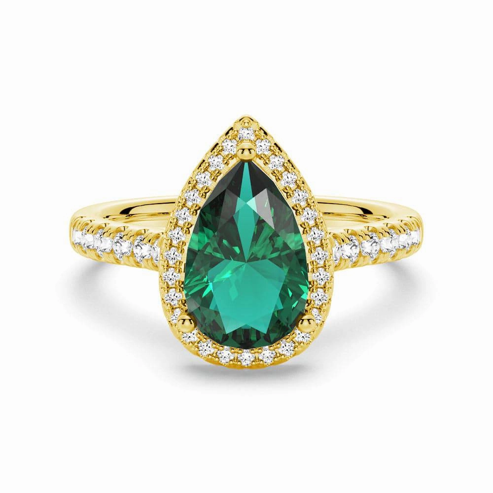 1.5 CT. Pear Shaped Emerald Ring with White Sapphire Halo Accents Gentle Finish Finest Detail