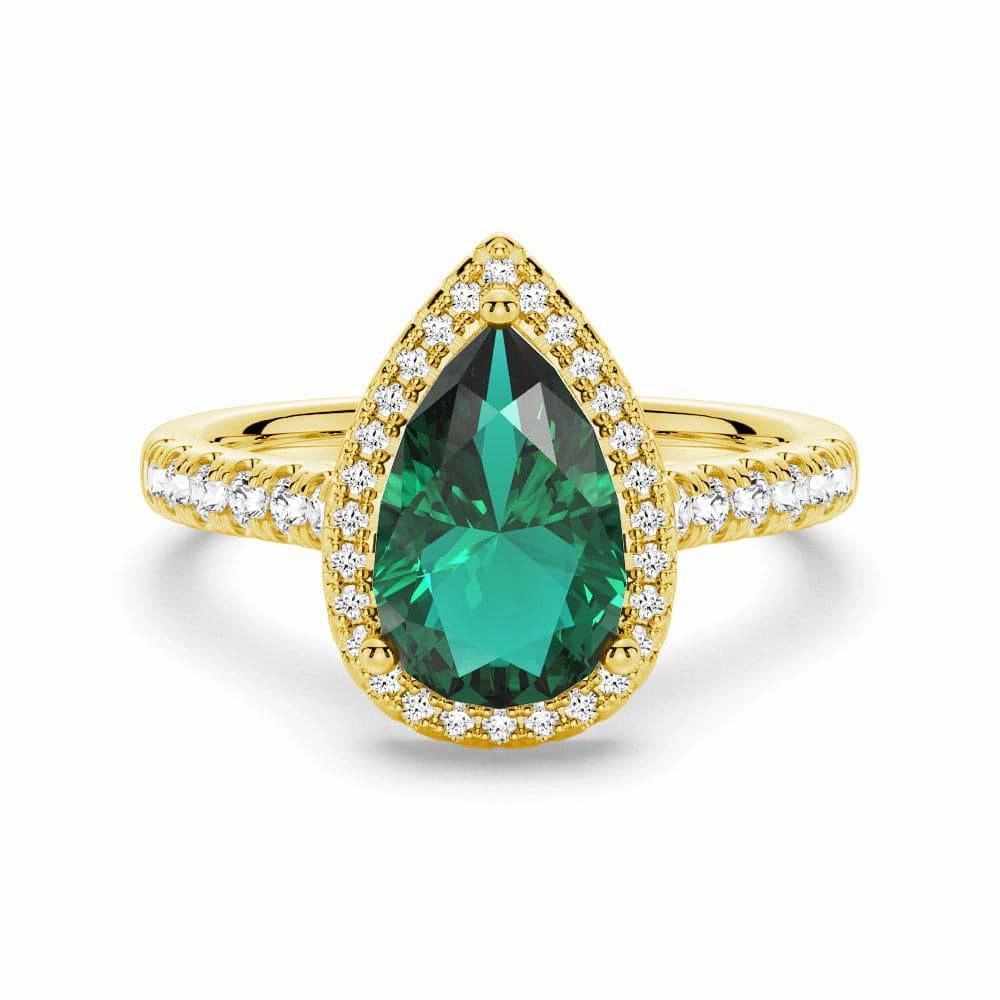 Romantic Touch 1.5 CT. Pear Shaped Emerald Ring with White Sapphire Halo Accents