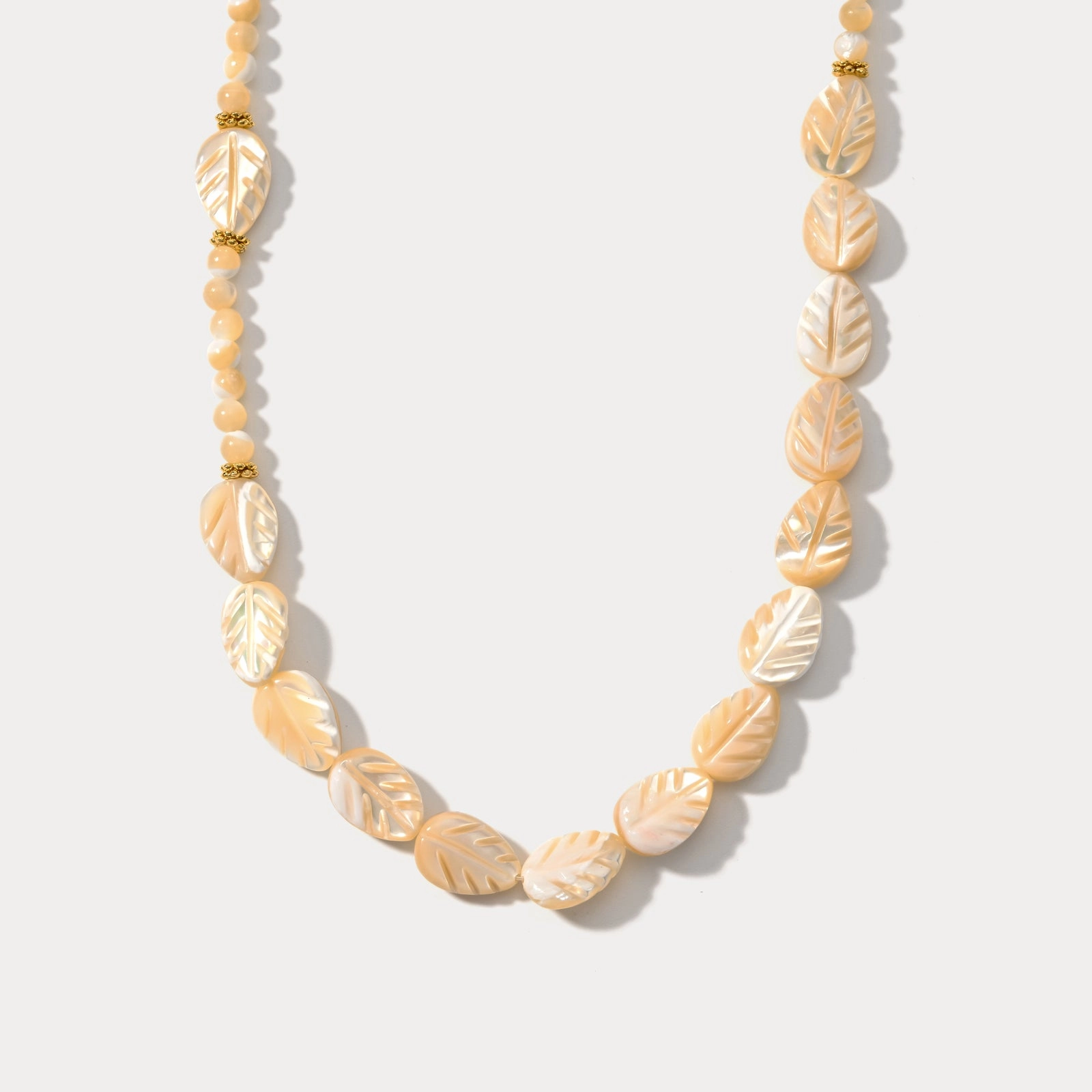 Carved Mother of Pearl Leaf Bead Necklace Unique Features