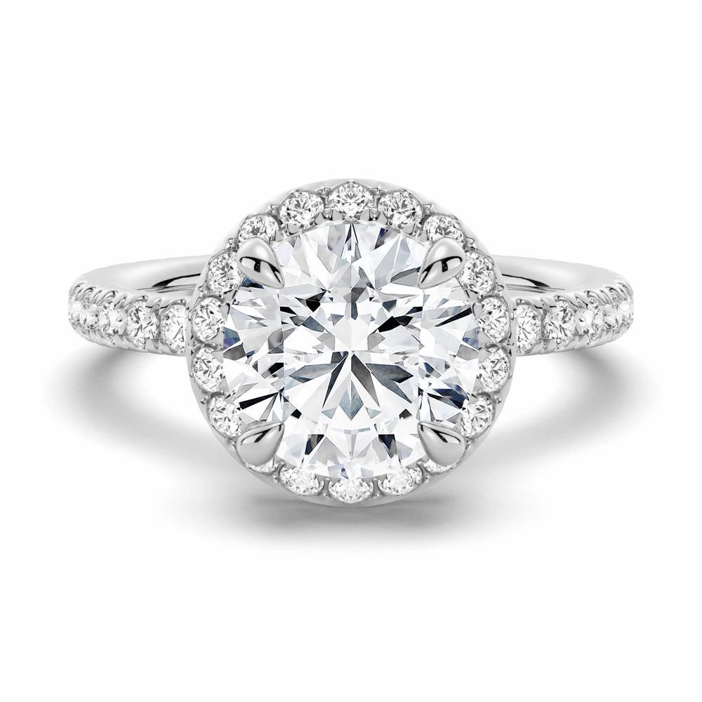 Artful Feature Modern Attire Round Brilliant Micropav?? Halo Moissanite Engagement Ring