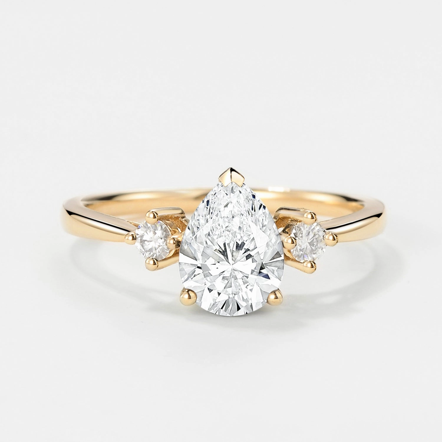 Petite Accent Pear Cut Lab Grown Diamond Three Stone Gold Ring