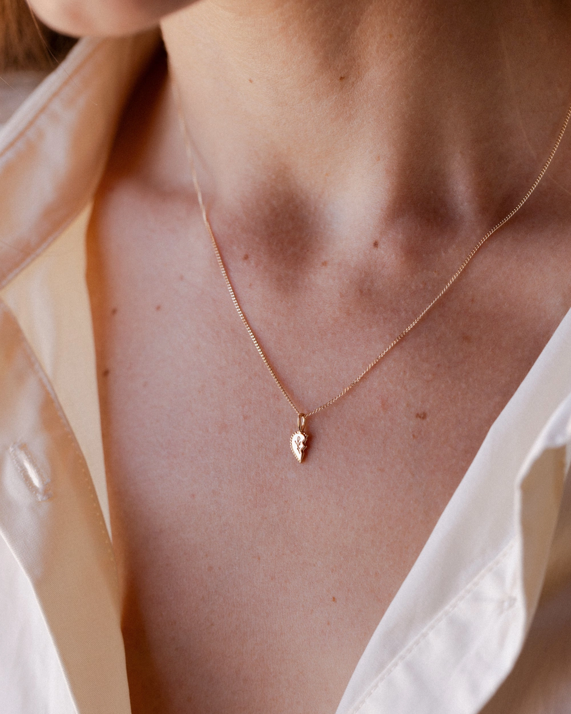 Exclusive Ornament Solid Gold Shared Heart Necklace