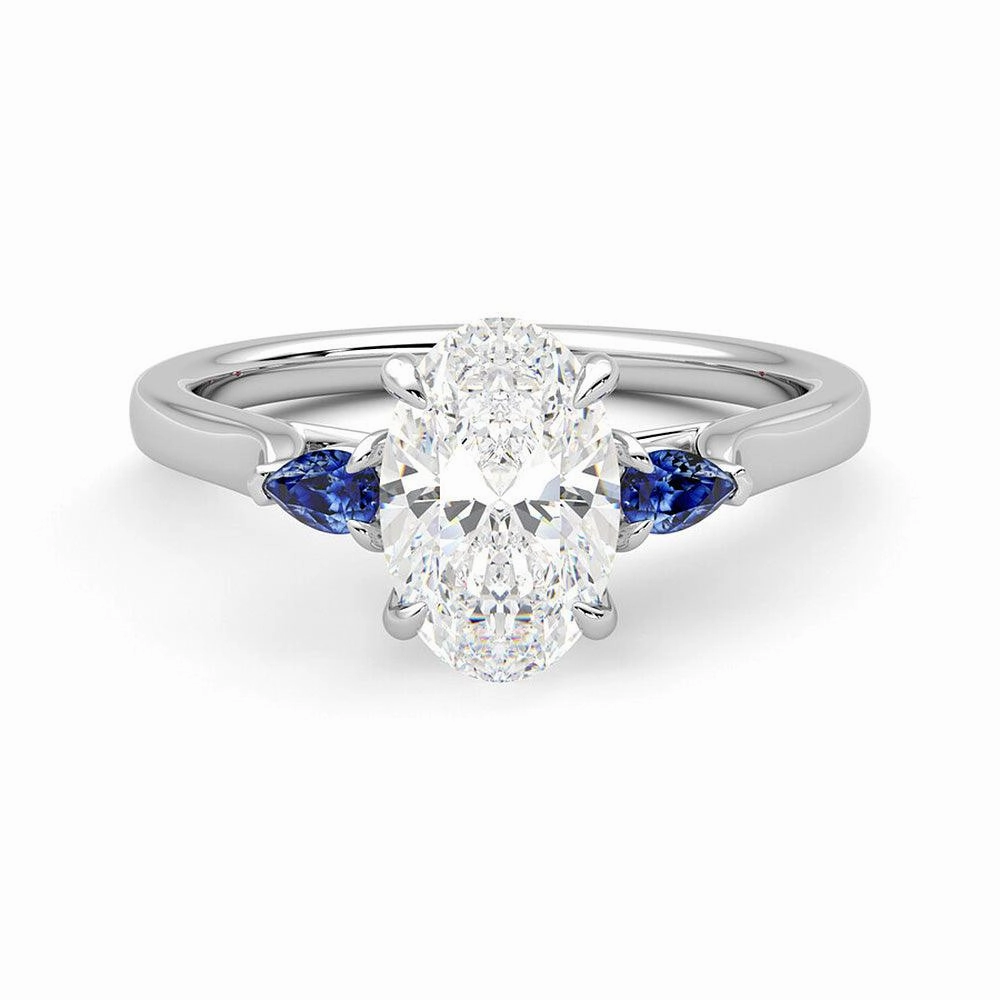 Alluring Edge Three Stone Oval Cut Moissanite and Sapphire Engagement Ring with Hidden Anniversary Stone Accent